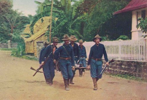 Wounded soldier being carried to Santa Mesa Hospital
