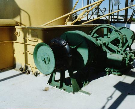 Steam winch on the Cruiser Olympia's open deck